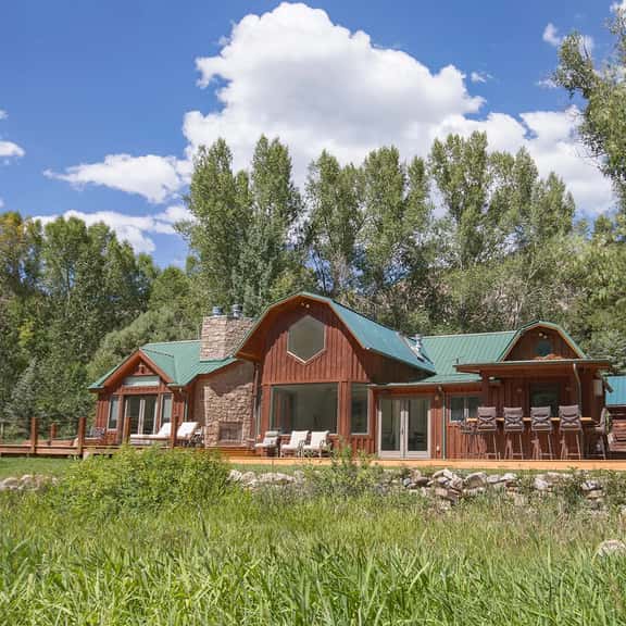 Riverside Retreat with Hot Tub - Image 1